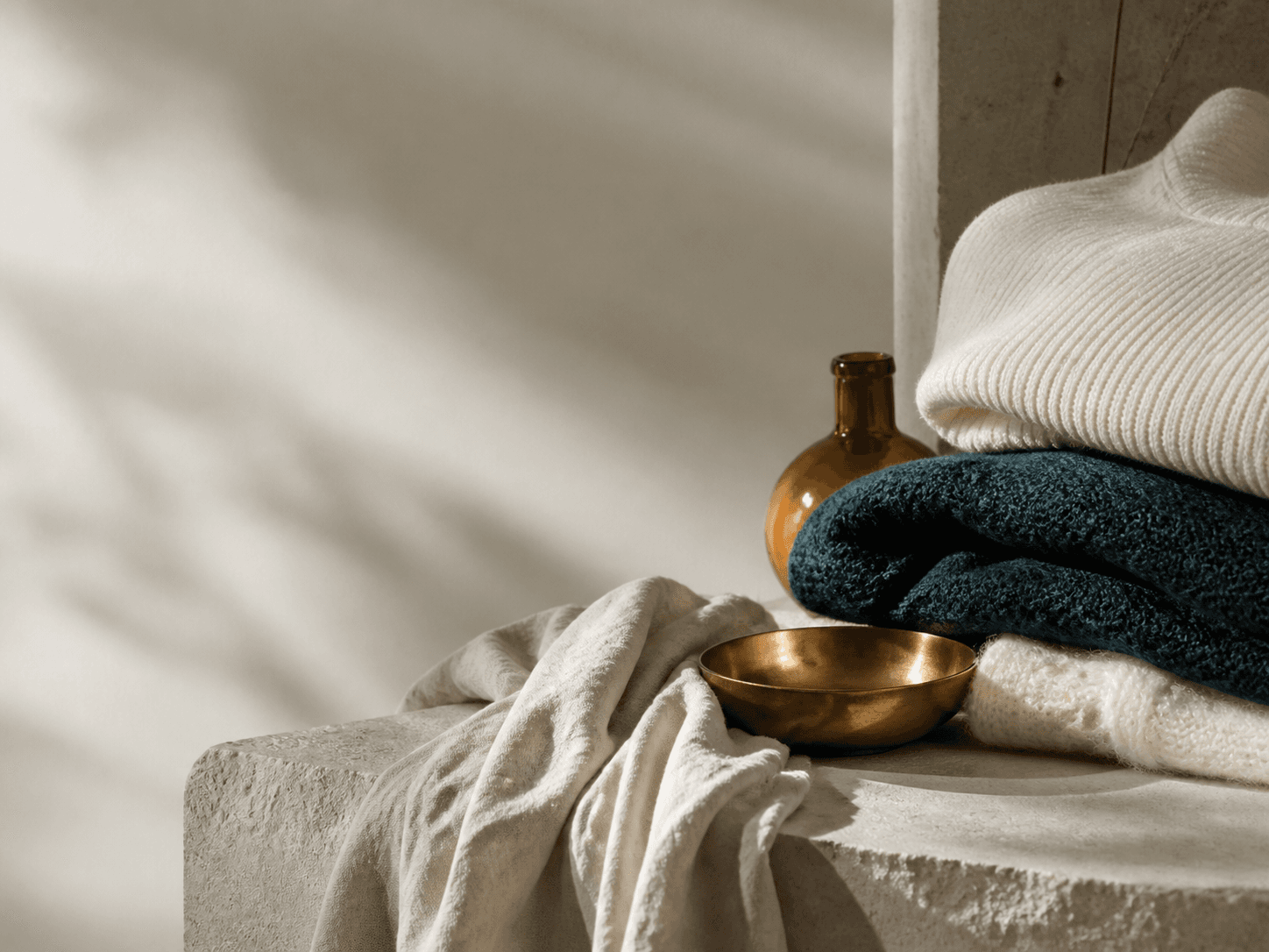 Folded knitwear in the ANH ZORVENA care ritual campaign